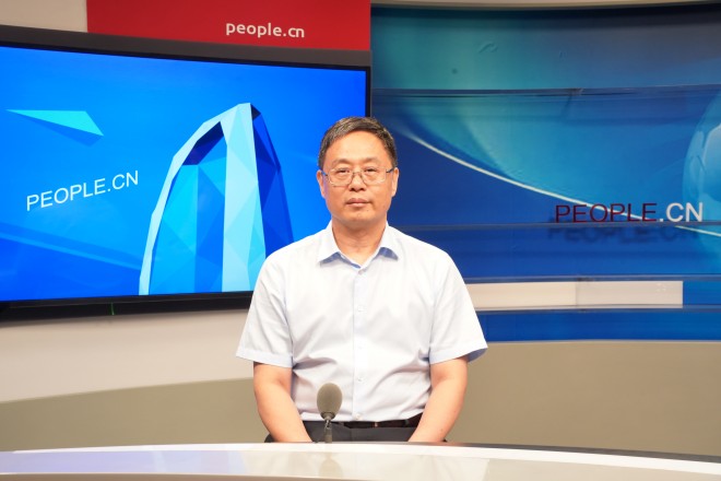 中國藝術研究院院長、黨委副書記周慶富做客人民網。張力洋攝